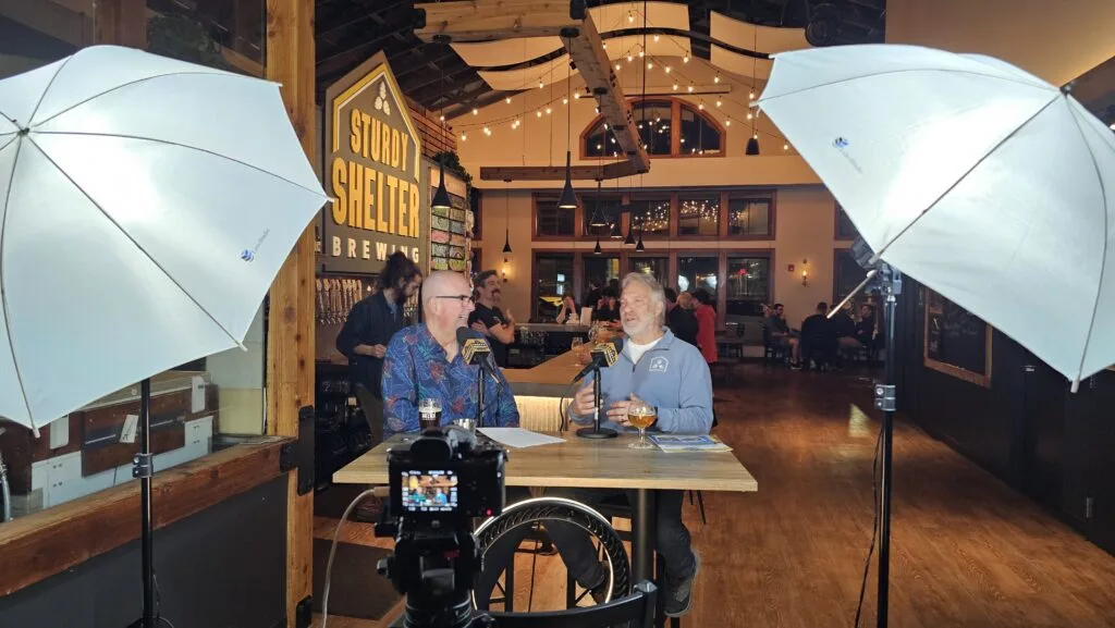 Crafty Brewers podcast host Brian Noonan (left) interviews Sturdy Shelter Brewing Owner Frank Mercadante (right) at his taproom in Batavia, Illinois