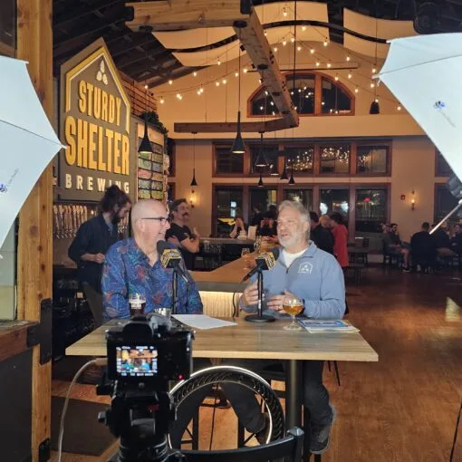 Crafty Brewers podcast host Brian Noonan (left) interviews Sturdy Shelter Brewing Owner Frank Mercadante (right) at his taproom in Batavia, Illinois